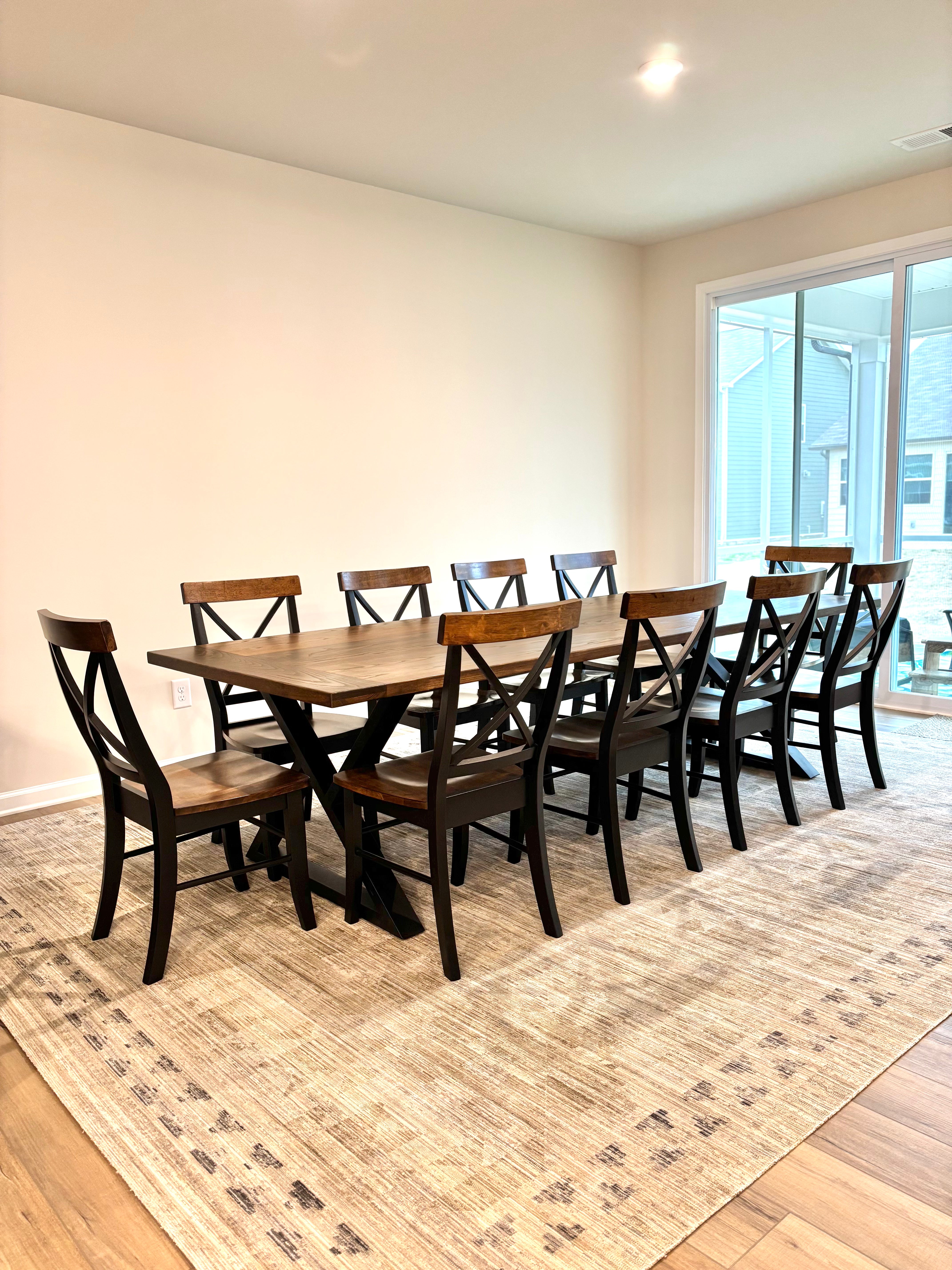 Dakota Table-Winter Buck Brown Finish with Black X Back Chairs & Matching Top Board