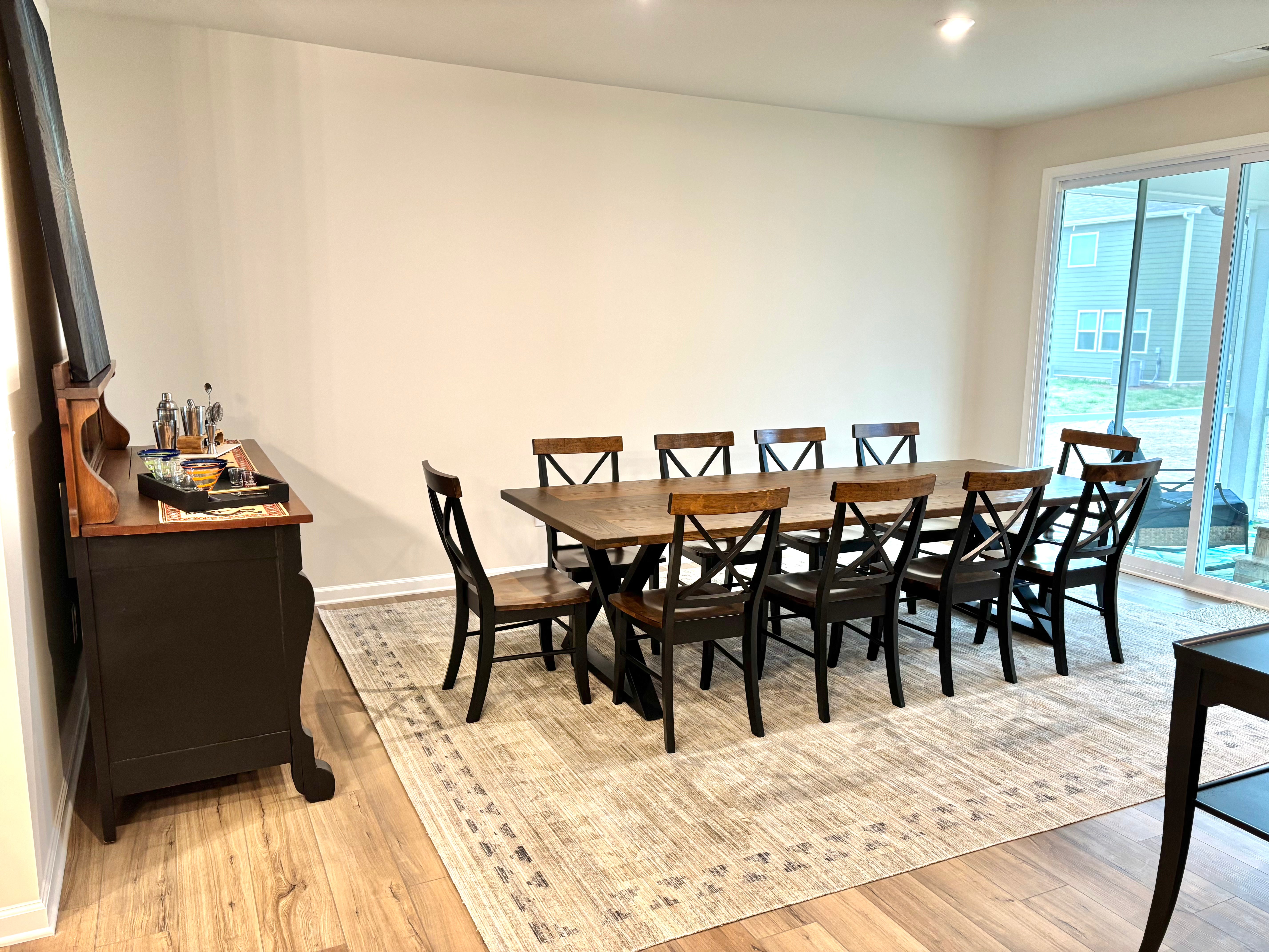 Dakota Table-Winter Buck Brown Finish with Black X Back Chairs & Matching Top Board